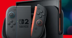 Nintendo Switch with gray left and orange right Joy-Cons docked on a red background. A blue ring surrounds the left joystick.