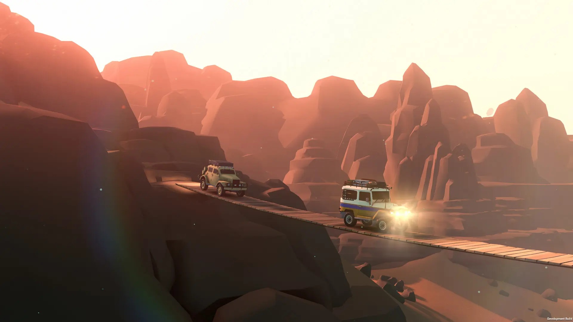 Over the Hill 2 | Loot Level Chill Two rugged off-road SUVs drive across a narrow wooden bridge spanning a red canyon at sunset.
