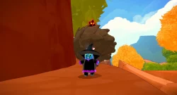 Cartoon witch character in black and purple walks along an orange dirt path with autumn trees and blue sky behind.
