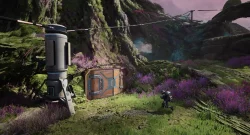 Astronaut in a futuristic suit crouches near a tall cylindrical base and a brown cargo crate in a vivid alien valley with purple flowers and green moss.