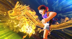 Anime soccer player in purple uniform kicks a glowing golden energy ball amid fiery flames on a stadium field.