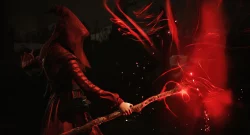 Dark fantasy scene with a hooded armored fighter swinging a glowing red staff as fiery energy swirls and sparks erupt around them.