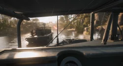 First-person view from a boat cockpit as two armed boats engage in a river firefight, gun mounts visible ahead and water splashing around.