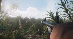 First-person view: holding a rifle amid dense tropical foliage with sunlight filtering through palm leaves