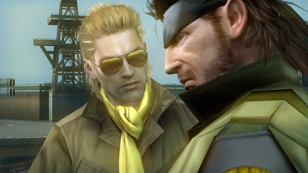 Metal Gear Solid Master Collection Vol2 review 2 | Loot Level Chill Two male video game characters in tan jackets converse closely on a ship deck, one wearing a yellow scarf and sunglasses.