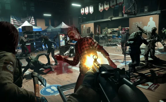 First-person view of a shooter in a gym fighting a bloodied zombie while survivors battle more undead in the background.