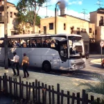 A large white coach bus stopped on a sunny urban street with passengers visible inside and people boarding from the sidewalk.