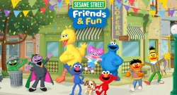 Sesame Street characters including Big Bird, Grover, Elmo, Abby Cadabby, and friends celebrate with confetti on a sunny city street in front of colorful stores.